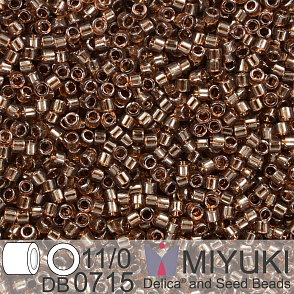 Korálky Miyuki Delica 11/0. Barva Tr Root Beer DB0715. Balení 5g.